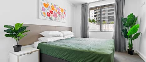 1 bedroom, laptop workspace, bed sheets