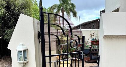 Cozy Tusmore Apartment With Private Garden City View Near Burnside Village Mall