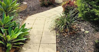 Cozy Tusmore Apartment With Private Garden City View Near Burnside Village Mall