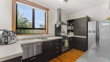 Fridge, microwave, dishwasher, coffee/tea maker