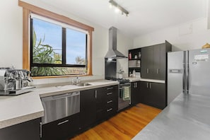 Fridge, microwave, dishwasher, coffee/tea maker