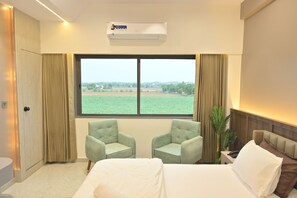 Superior Suite | Free WiFi, bed sheets - Plumeria Hotel  (Bhuj)