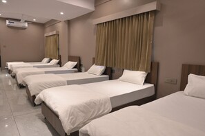 Luxury Room | Free WiFi, bed sheets - Plumeria Hotel  (Bhuj)