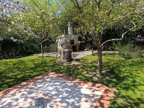 A reflection in the world - family-friendly holiday home amid the Tuscan hills.