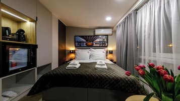 In-room safe, desk, laptop workspace, iron/ironing board