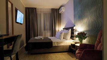 In-room safe, desk, laptop workspace, iron/ironing board