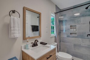 Regadera y secadora de cabello 