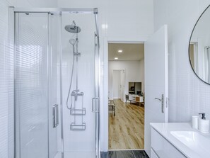 Shower, hair dryer, towels, toilet paper