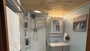 Hair dryer, towels, soap, shampoo