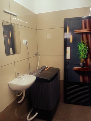 Shower, towels, toilet paper