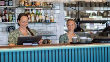 Lunch, dinner served; local cuisine, ocean views