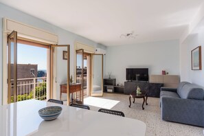 Apartment, 2 Bedrooms, Balcony | Living area | 30-inch TV with satellite channels