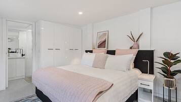 1 bedroom, laptop workspace, iron/ironing board, bed sheets