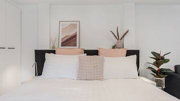 1 bedroom, laptop workspace, iron/ironing board, bed sheets