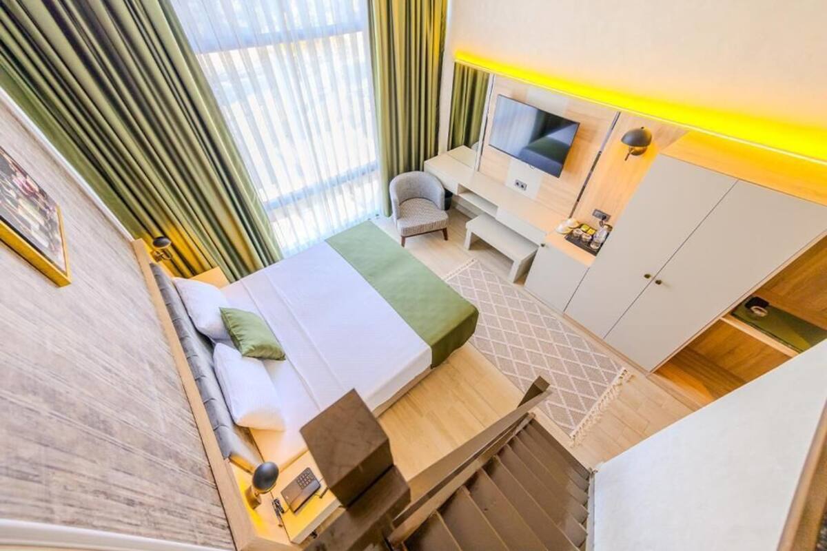 Family Room, City View | Desk, laptop workspace, free WiFi