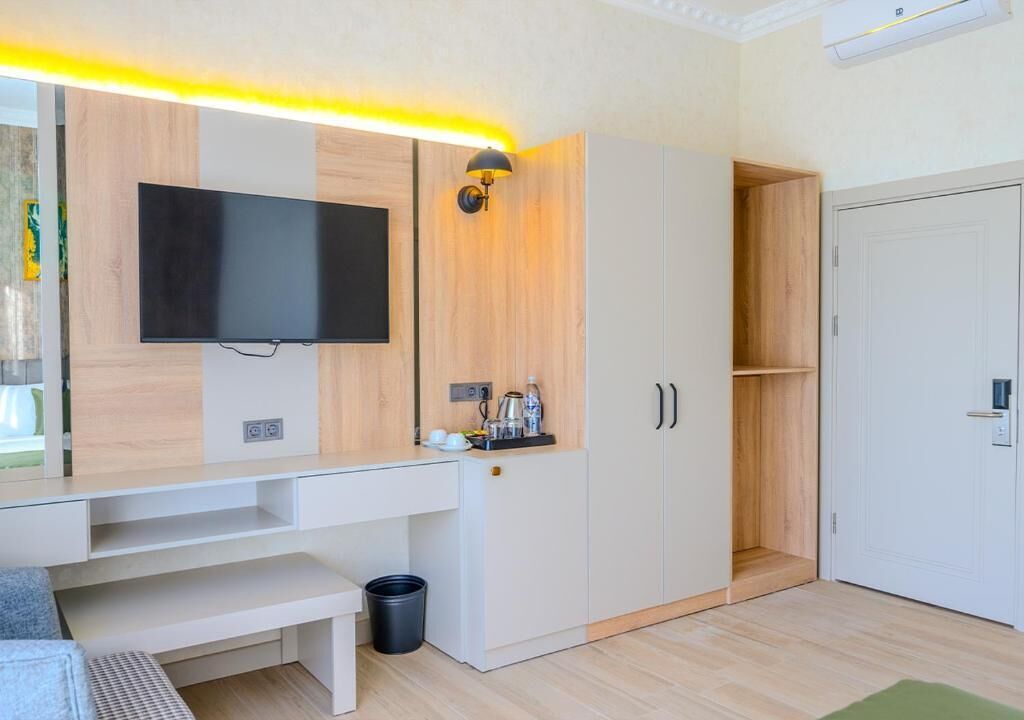Chambre Standard | Coin séjour | Télévision LED de 42 pouces avec chaînes par câble