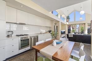 Apartment | Private kitchen | Fridge, microwave, oven, stovetop - Gorgeous 2-bed Victorian Home in Artsy (Melbourne)