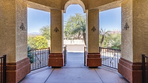 A covered outdoor area with a view of a garden and mountains. - Groups Welcome! Home w/ Pool + Patio in N Phoenix (Phoenix)