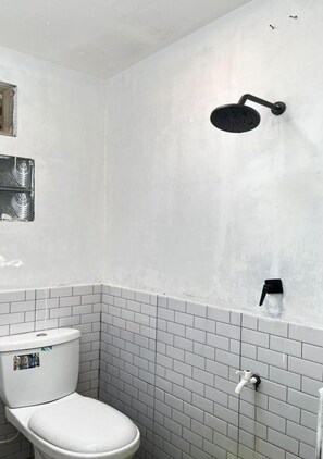 Habitación familiar, patio | Baño