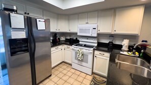 Departamento, 2 habitaciones | Cocina privada | Refrigerador, horno, cafetera y tetera y tostadora 