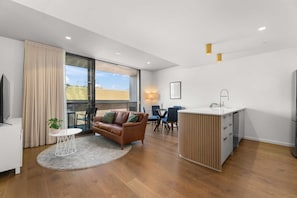Apartment | Living area - Experience Elegance in This Chic 1-bed Unit (Canberra)