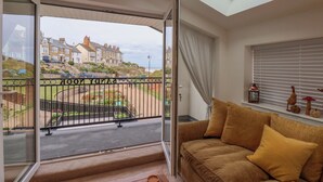 A balcony with a view of a residential area and the sea. - Sandy Nook (Redcar)