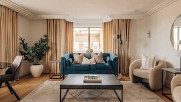 Deluxe Apartment, 2 Bedrooms, Kitchen | Living area | 43-inch Smart TV with digital channels