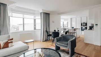 Deluxe Apartment, 1 Bedroom, Kitchen | Living area | 43-inch Smart TV with digital channels