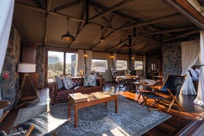 Presidential Suite, Patio, Mountain View | Living area | Fireplace