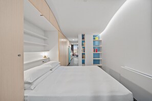 1 غرفة نوم ومكواة/لوح كي وملاءات أسرّة