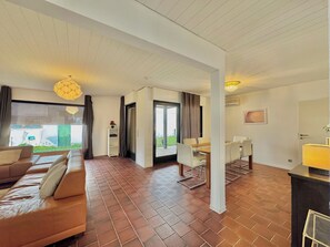 Villa Confort, vue sur le jardin | Aire de séjour