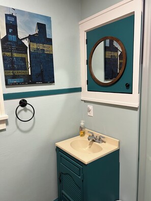 Shower, hair dryer, towels, toilet paper