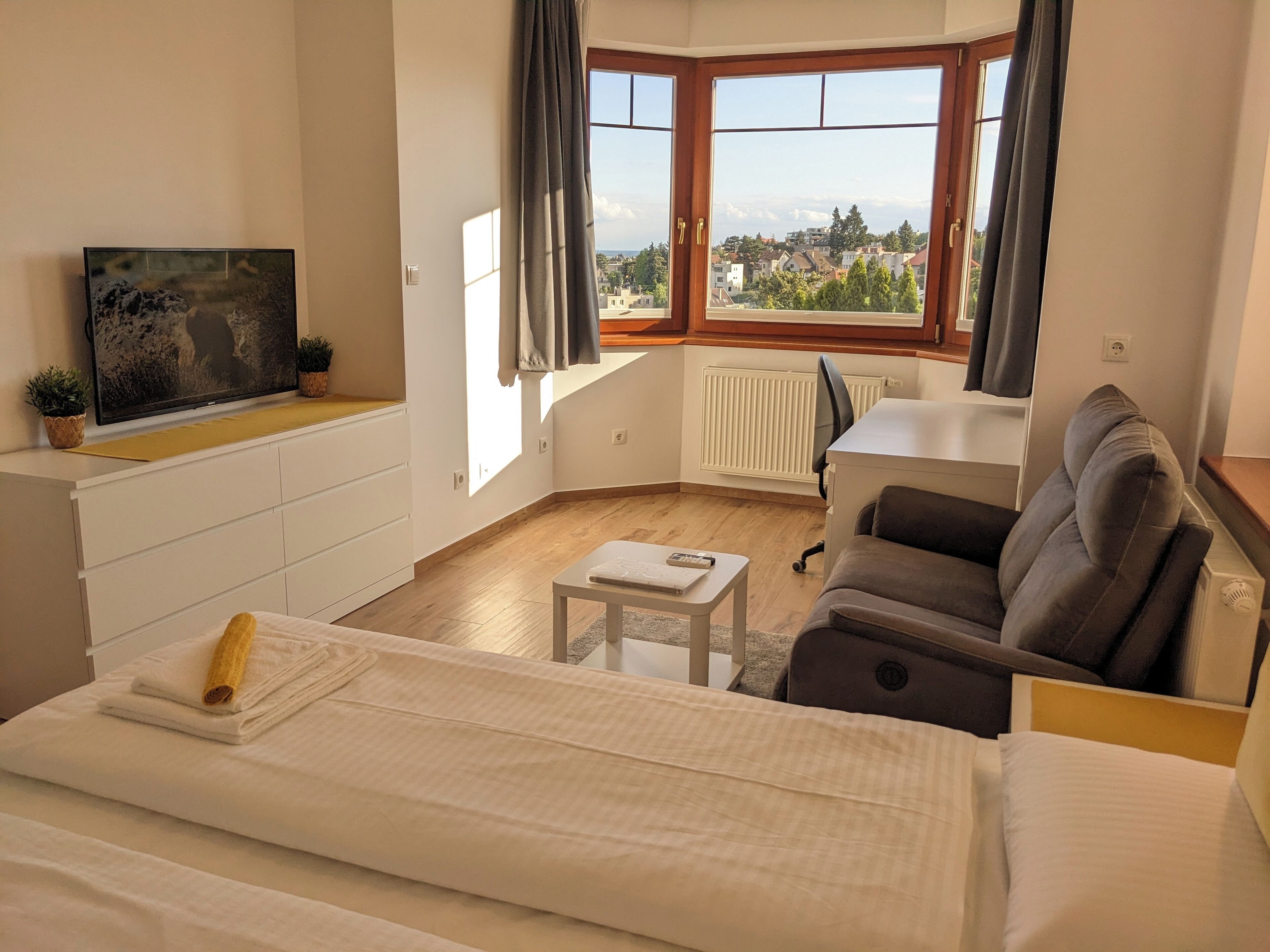 Panoramic Apartment, Balcony, City View | Hypo-allergenic bedding, blackout drapes, iron/ironing board, free WiFi