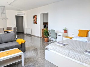 Appartement, balcon, vue ville | Rideaux occultants, fer et planche à repasser, Wi-Fi gratuit