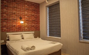 Eenvoudige tweepersoonskamer | Een strijkplank/strijkijzer, gratis wifi