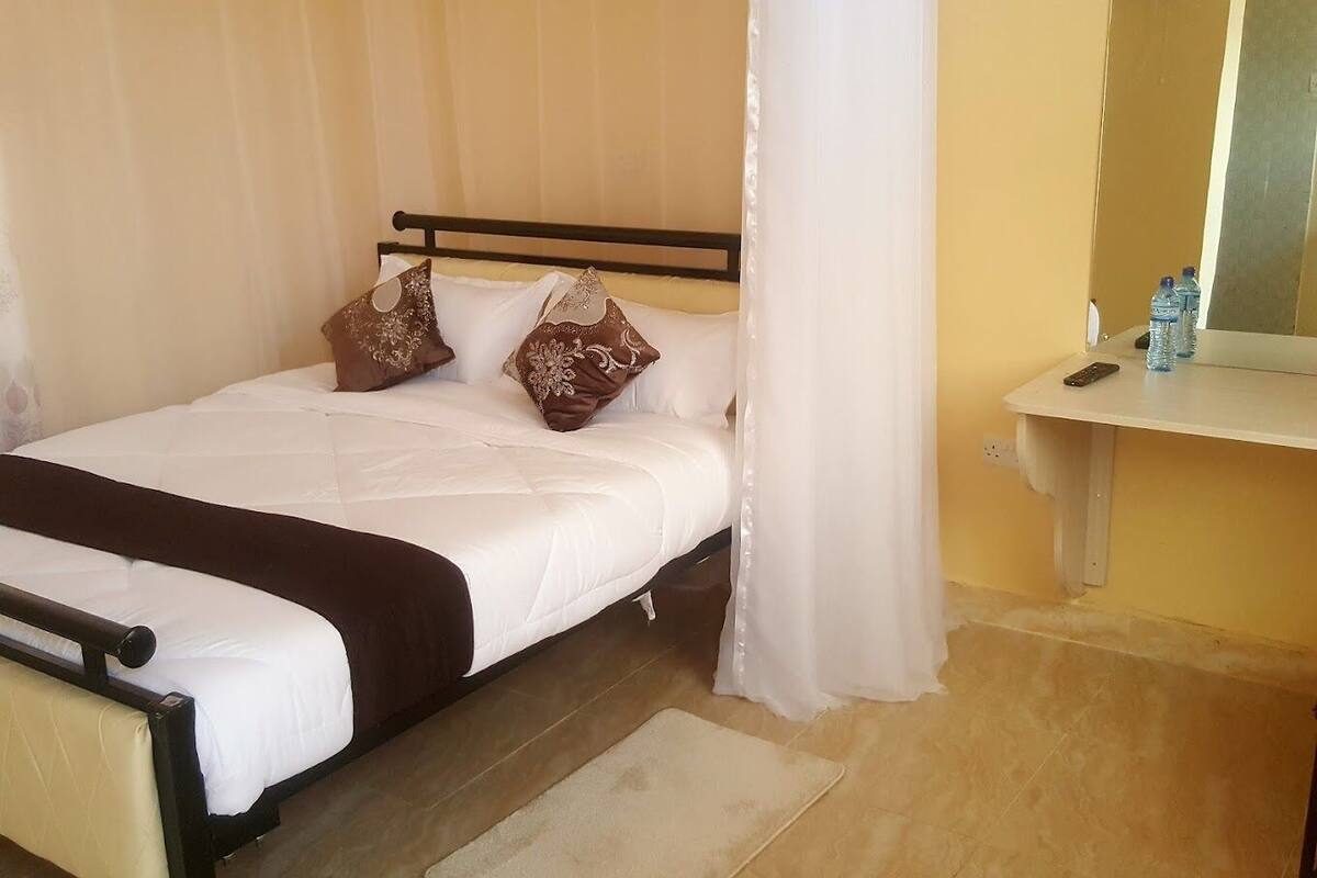 Habitación individual Deluxe | Wifi gratis y ropa de cama