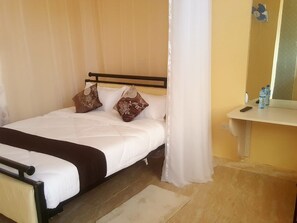 Habitación individual Deluxe | Wifi gratis y ropa de cama