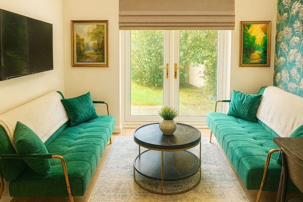 Spacious living area with desk table workspace