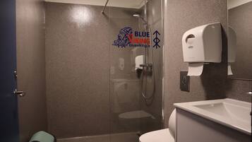 Shared Dormitory, 1 Double Bed | Bathroom | Shower, hair dryer, towels, soap