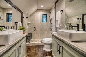 Shower, hair dryer, towels, shampoo