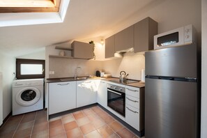 Departamento, 1 habitación | Cocina privada | Cafetera de espresso, cafetera y tetera y tetera eléctrica 