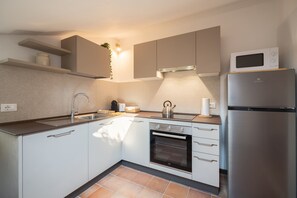 Appartement, 1 slaapkamer | Privékeuken | Een espressoapparaat, een koffiezetapparaat/waterkoker, een waterkoker