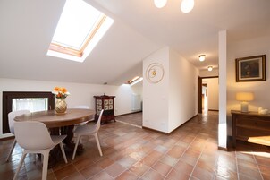 Apartment, 1 Bedroom | Living area | 30-inch TV with satellite channels