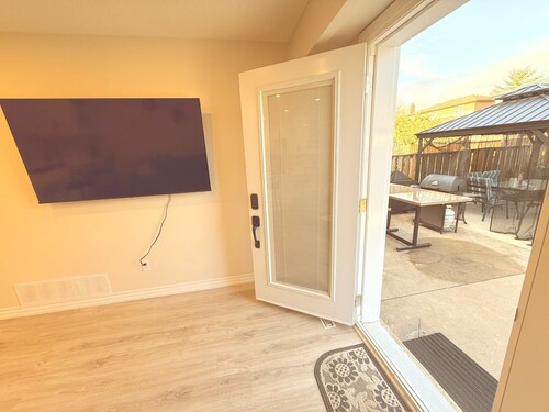 Modern 1-Bedroom Private Suite near SQUARE ONE w/ Laundry, EV Charger & BBQ Area