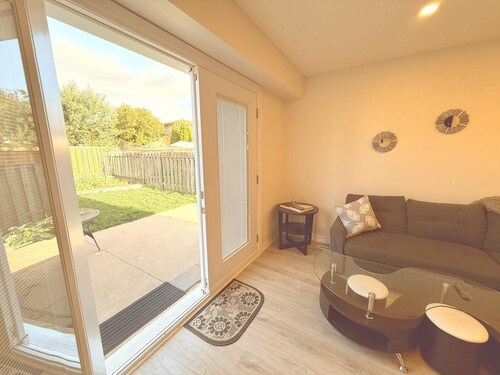 Modern 1-Bedroom Private Suite near SQUARE ONE w/ Laundry, EV Charger & BBQ Area