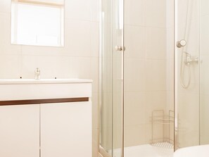 Regadera y secadora de cabello 