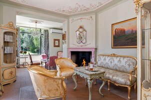 Villa, Lake View | Living area | 30-inch TV with digital channels