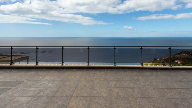 A terrace with a view of the sea and a clear sky. - Skyline Villas Top - Fantastic sea view (Calheta)