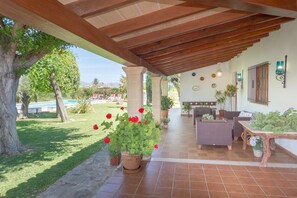 Terrace/patio - Delightful pool and surrounds. 3 bedrooms 2 bathrooms. Play area with Net/basket ball net facility. Easy access to historic town of Pollensa and not far from  beautiful beaches of Alcudia. (Alcúdia)