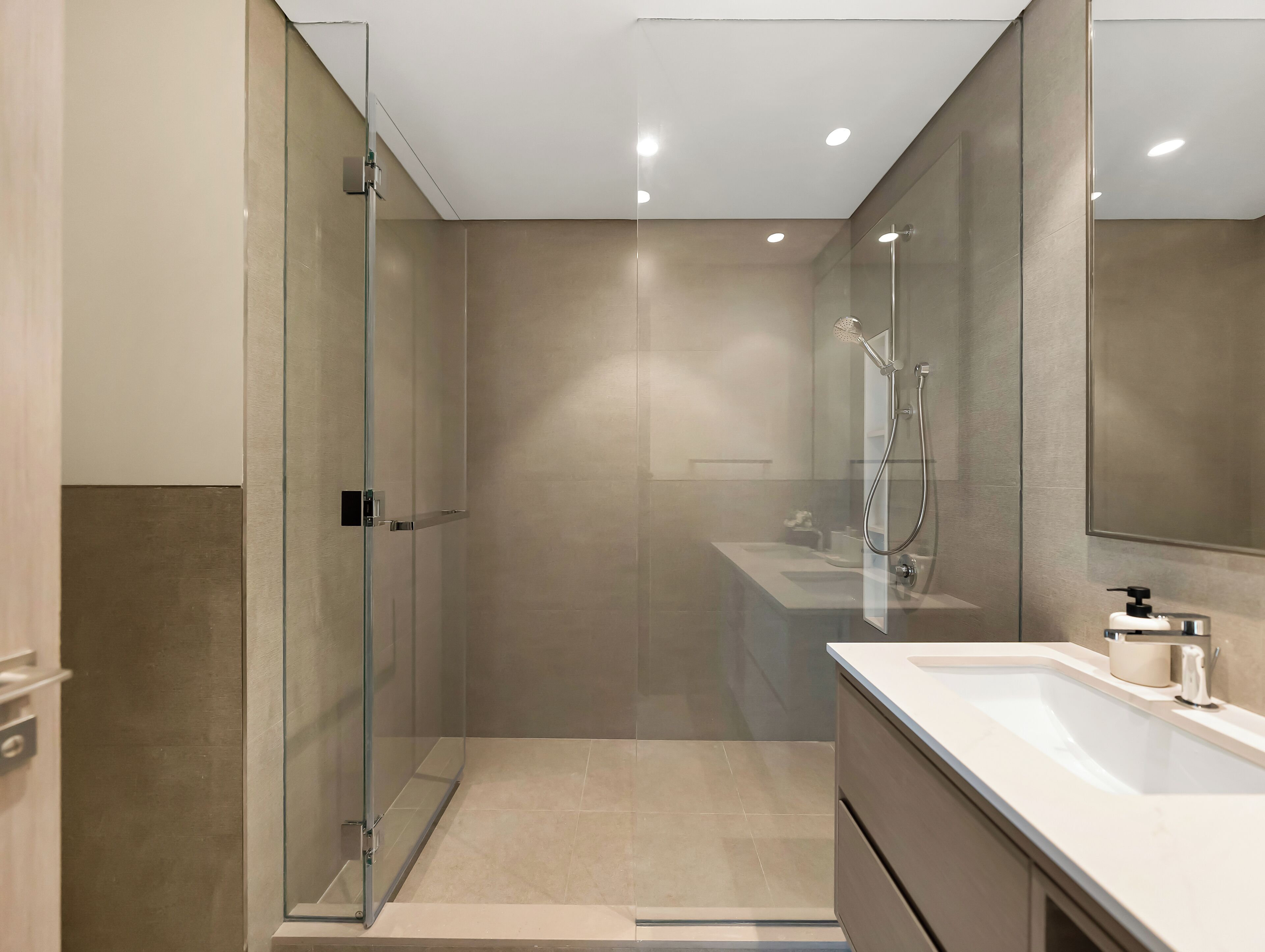 Separate bathtub and shower, hair dryer, towels